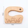 Handcrafted beech wood toy knife for kids with engraved wave patterns, 100mm size - Dinosaur