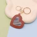 Brown PU leather heart-shaped keychain with integrated mirror and golden metal clasp - Heart Coffee