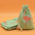 Mint green linen jewelry pouch with orange flamingo print and cotton drawstring - Green Flamingo