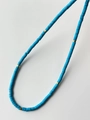 Modern beaded necklace featuring sky blue natural stone cylinders with gold metal spacers - Blue Turquoise