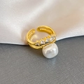 Detail of gold open ring featuring baroque pearl and sparkling cubic zirconia crystals - Double Layer Cross Zircon Pearl Style (5 Rings-Gold)