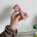 Elegant dusty pink satin bow hair clip featuring a double-layered silk texture design - Light Pink