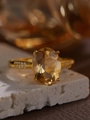 S925 sterling silver ring featuring a large yellow gemstone with small side diamonds - Citrine Scattered Diamond Decor Style (LR223)