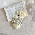 Pale yellow striped cotton ankle socks with a small black heart logo on the ribbed cuff - Milk Yellow