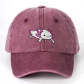 Detailed close-up of cute pink axolotl embroidery on washed purple cotton baseball cap - One Size / Burgundy
