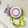 Borsa a tracolla rotonda bianca con dettagli rosa e cinturino logo giallo-verde - Bianco con Tracolla Verde