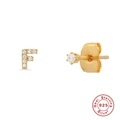 Macro detail of S925 sterling silver initial F stud earring with sparkling gold plating - Letter F / Gold