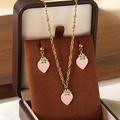 Golden titanium steel jewelry set featuring pink enamel strawberry necklace and earrings - Pink Strawberry Jewelry 3-Piece Set (KS226005-Z)