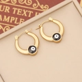 Golden stainless steel evil eye hoop earrings with enamel inlay on a beige tray - 3# (Gold Horseshoe Black White Eye)