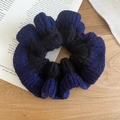 Macro shot of chunky knit scrunchie with navy and black color-block pleated textures - Hair Tie / Blue and Black