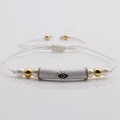 Handmade Evil Eye beaded bracelet with copper beads and pearls on white cord - White