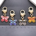 Colorful butterfly keychains in pink blue yellow black with golden heart lobster clasps - 4-Color Set