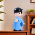Resin statue of a young boy in blue robes reading a book, decorative desktop ornament - Boy Reading Style (2104-60)