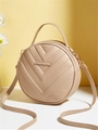 Beige round crossbody bag with V-quilted texture and gold metal logo detail - Apricot