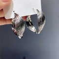 Silver 925 twisted multi-layer hoop earrings with a textured metal finish on display - 925 Sterling Silver Earring Post Twisted Hoop