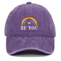 Detail of rainbow and BE YOU embroidery on washed purple cotton baseball cap surface - One Size / Purple
