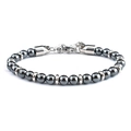 Detail view of dark grey map stone beads and silver metal lobster clasp on the bracelet - Hematite
