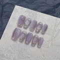 Detail of purple cat-eye press-on nails with silver foil on a textured stone surface - Extra Small (XS) / Purple/Short Coffin