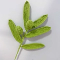 Handmade crochet olive branch in green yarn with two fruits and five leaves - Olive