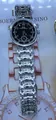 Business ladies watch featuring a silver stainless steel strap and a black round dial - Black