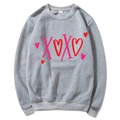Grey crewneck sweatshirt featuring pink and red heart prints with XOXO text detail - S / Tops / Light Gray