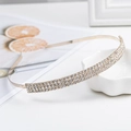Elegant gold metal bridal headband featuring three rows of sparkling clear rhinestones - Gold (D2527)