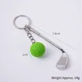 Mini metal golf club and bright green ball keychain with silver keyring attachment - Green Golf Ball + Club