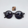 Detail of black matte round kids sunglasses with UV400 protection and CE mark labels - Kids / Midnight Black