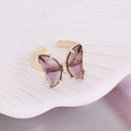 Macro view of purple crystal butterfly ring with gold-plated claws and faceted glass wings - One Size / Dark Purple
