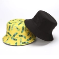 Reversible bucket hats in solid black and yellow with cute cartoon pickle embroidery - Yellow Pattern