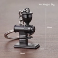 Miniature vintage coffee grinder keychain in glossy black metal finish with key ring - Ghost Tooth Grinder