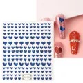 Blue metallic heart nail stickers TH-1059 with glitter finish application effects - TH-1059 (Blue Metallic Heart)
