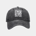 Close-up of black washed cotton baseball cap with white text print and stitched brim - Adjustable / Black