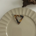 Detailed view of a dark tortoiseshell acetate hair claw clip with triangular design - Triangle Snap Clip