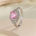Elegant heart-shaped pink zircon ring with tiered white gemstone halo in silver finish - US 7 / Silver Pink