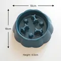 Blue dog slow feeder bowl with bone-shaped obstacles for choking prevention, 18cm diameter - PP / Dark Blue