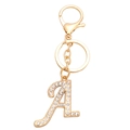 Gouden letter A sleutelhanger met glanzende steentjes en karabijnsluiting op wit decor - Letter A