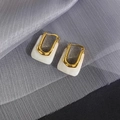 French vintage U-shape gold earrings with white marble resin inlay on mesh fabric - White