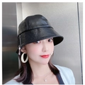 Detail view of a black leather bucket hat with a stylish silver zipper decoration - Black Zipper (Bucket Hat)