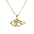 Macro detail of gold Evil Eye pendant with blue stones and cubic zirconia inlay - Style 1724-White Zirconia / Gold