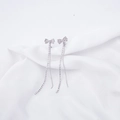 Silver bow earrings with rhinestones and long tassels on white silk background - Silver Bowknot Tassel
