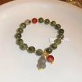 New Chinese style green beaded bracelet with a purple gourd pendant and gold accents - Green Jade Gourd (HB1248)