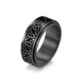 Detailed close-up of a black titanium spinner ring featuring Celtic triquetra patterns - Black