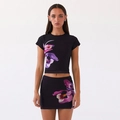 Detail van crop top en kokerrok set met levendige paarse orchidee bloemenprint stof - S / Zwart