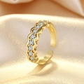 Close-up of S925 hallmark on a gold-plated wavy ring with eight sparkling crystals - Gold (J325)