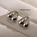 Polished silver heart stud earrings with 3D design on white leather background - 1.9x2cm / Silver Heart