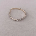 Elegant gold-plated tennis ring with sparkling square-cut crystals on beige fabric - 3019 Single Layer Gold