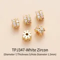 Macro detail of 7mm gold-plated brass cylinder spacer beads with white zircon inlay - Double Row Pave Round Cylinder Style (TPJ347-White Zirconia) / Gold