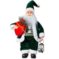 Staande Kerstman pop in bosgroen fluwelen pak met een zak cadeaus en lantaarn decoratie - Groene Kerstman