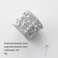 Silver bead garland for Christmas tree with 3mm and 8mm alternate beads on 10m roll - Silver Fishing Line Beads 10m
